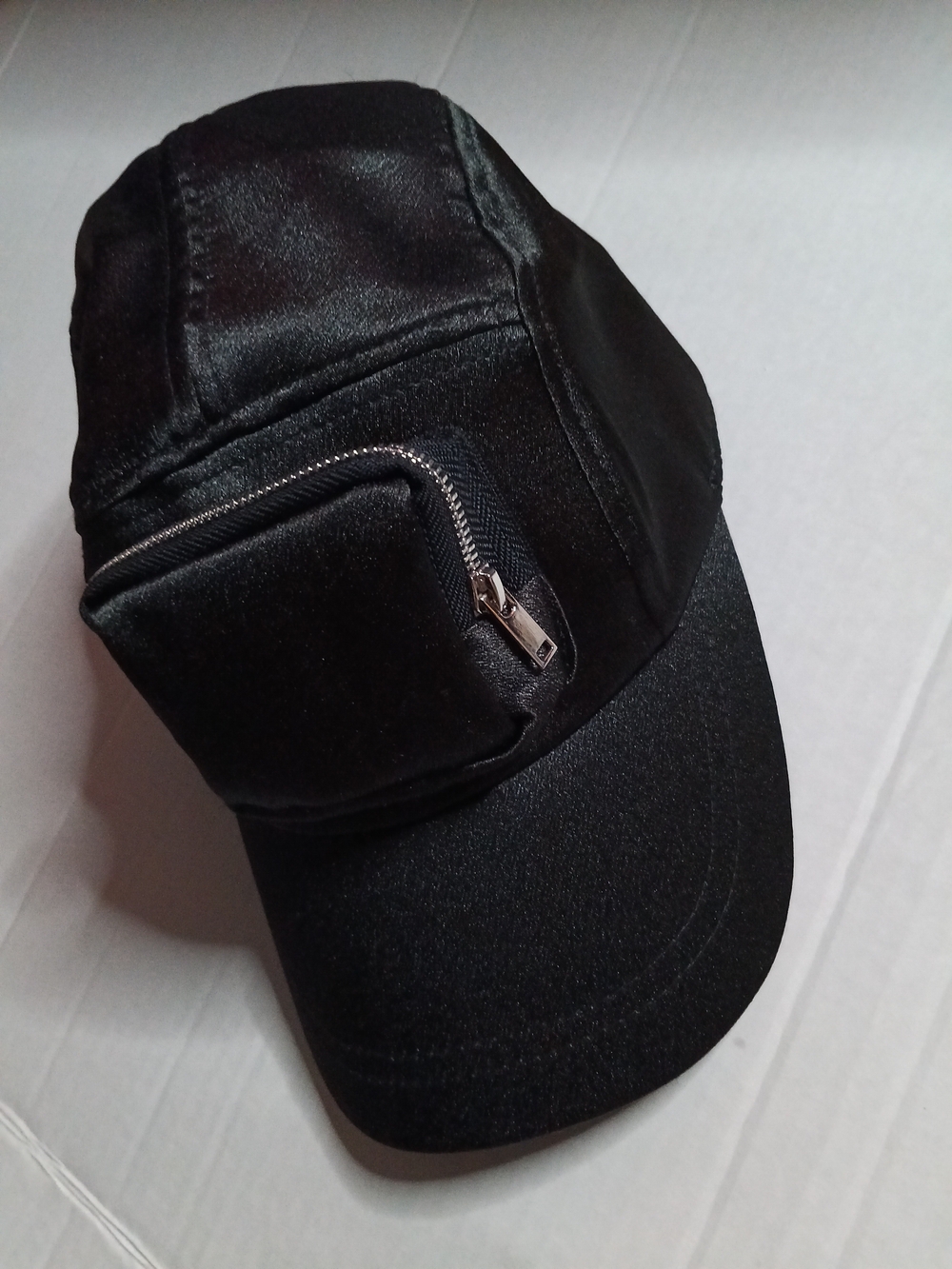 AKIRA Black Satin Cap with Branded Tag